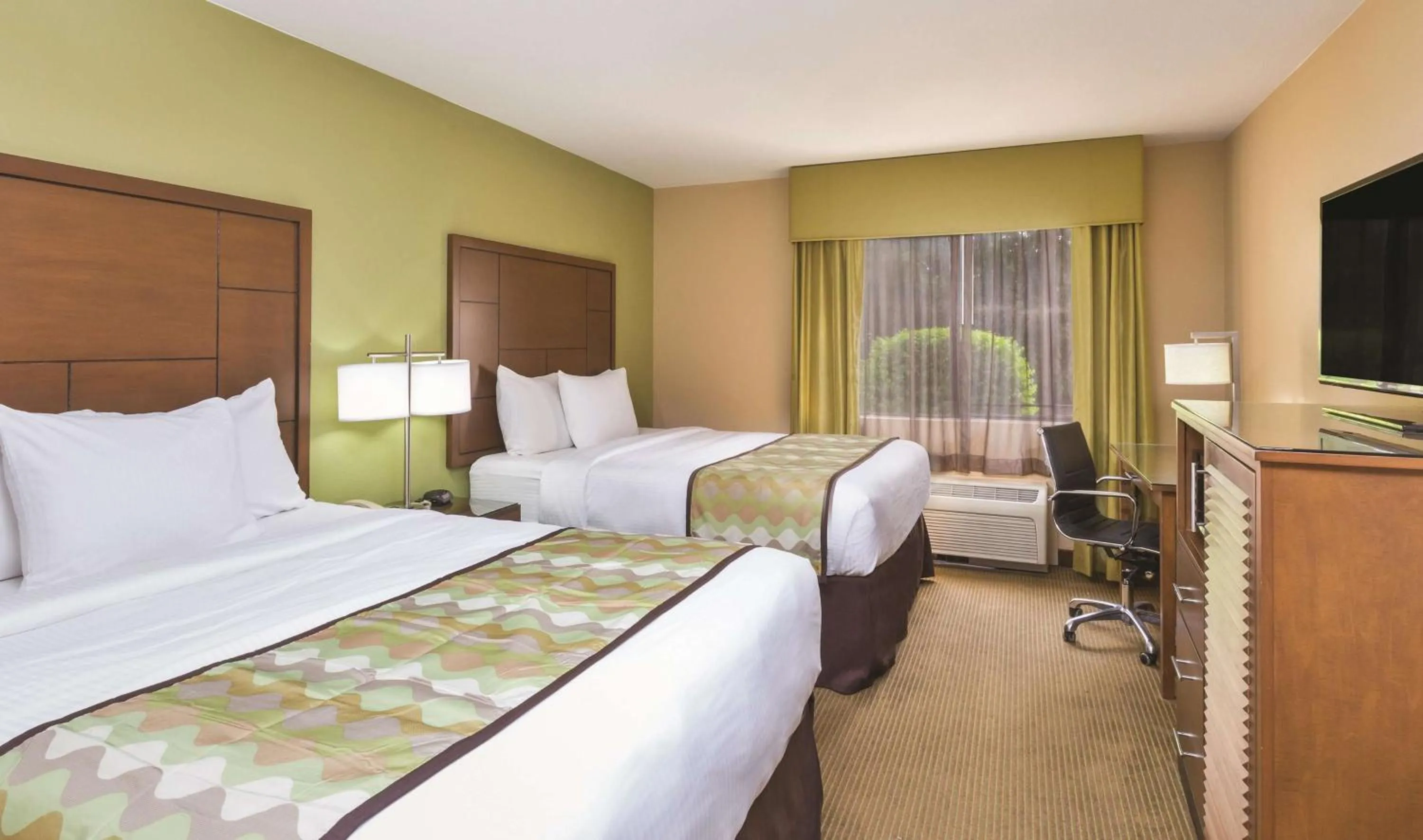 Photo of the whole room, Bed in La Quinta Inn by Wyndham Austin North